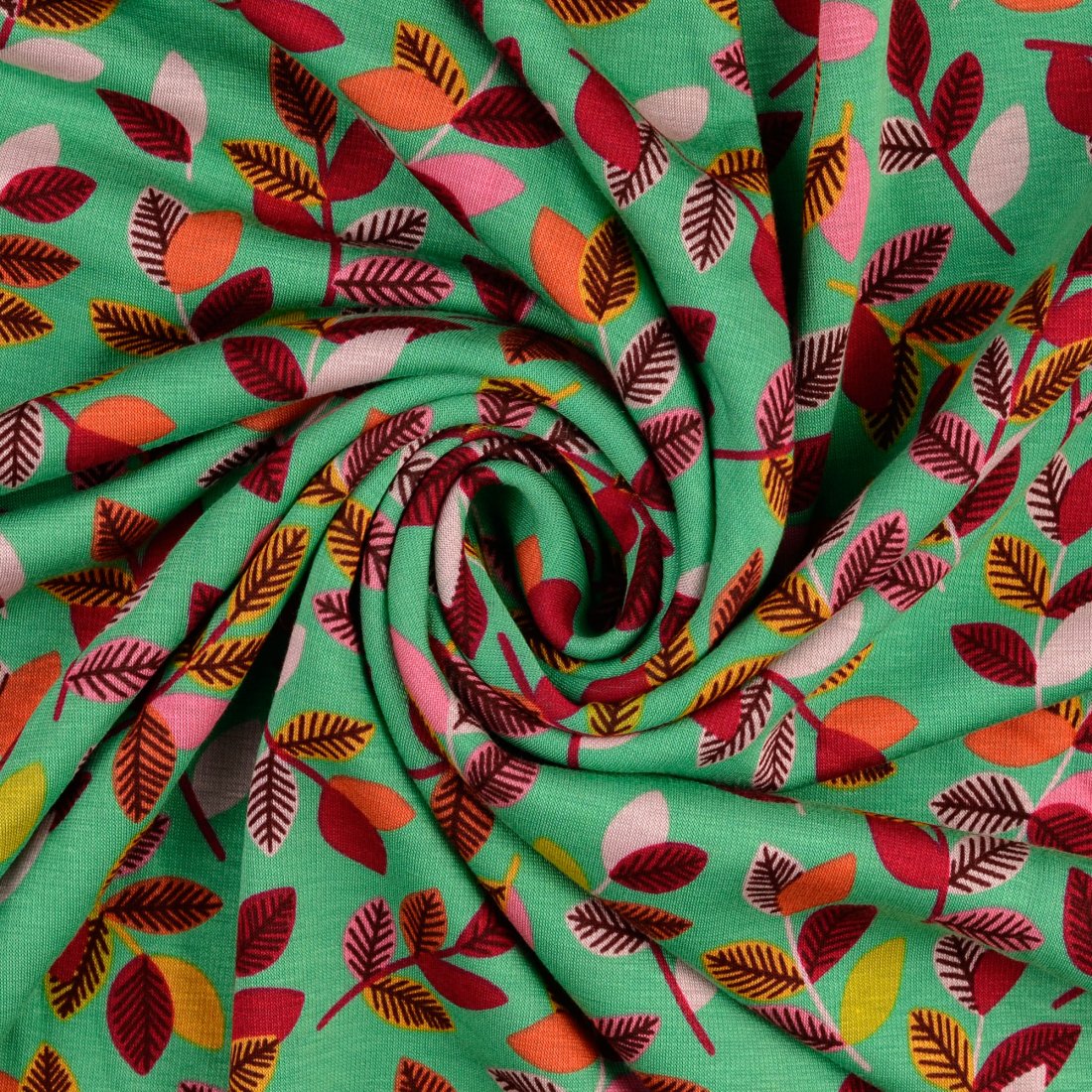 Tissu molleton alpfleece imprimé feuilles multico envers doudou