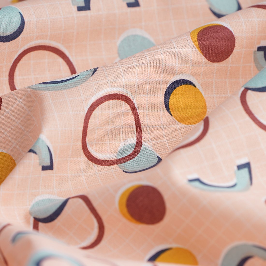 Tissu coton rose formes géométriques