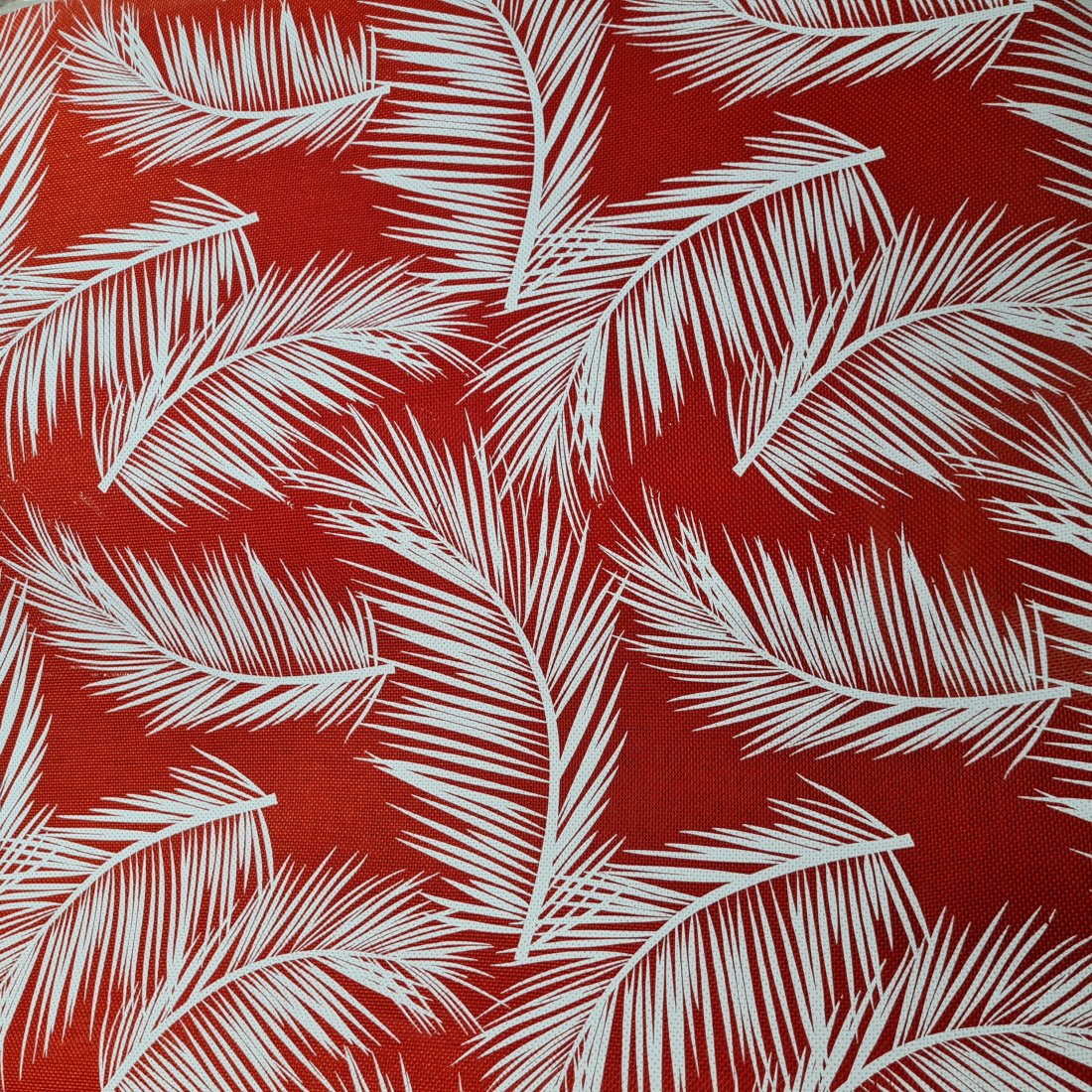 Toile effet jute rouge motifs feuilles blanches