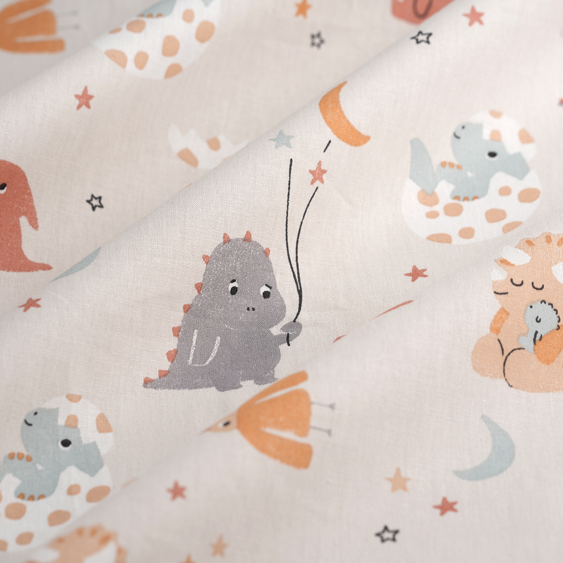 Tissu cretonne bébé dinosaure multicolore - MT