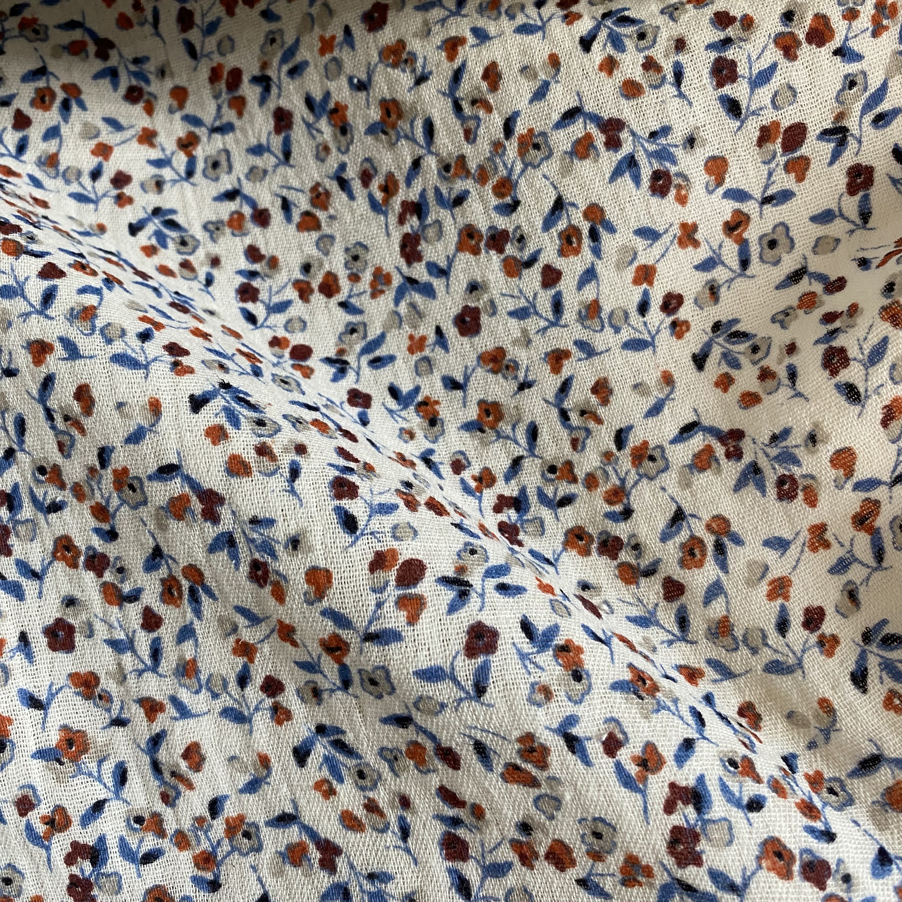 Tissu double gaze bio blanche motifs fleurs orange