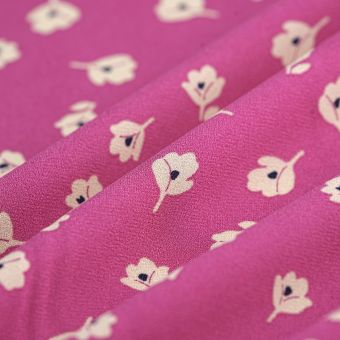 Tissu crêpe polyester fleur bicolore écru fuchsia