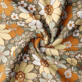 Tissu cretonne enduit imprimé grosse fleur seventies vert et orange
