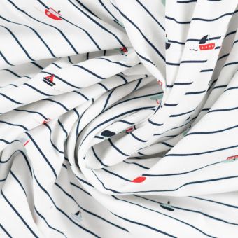 Maille jersey coton imprimée bateau sur fond rayé bleu