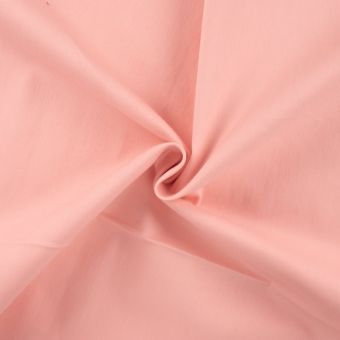 Tissu denim coton stretch uni rose saumon