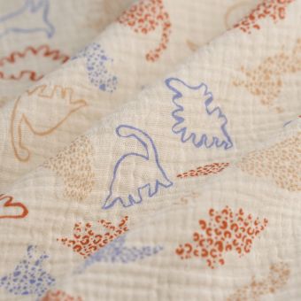 Tissu double gaze dinosaure contour bleu écru