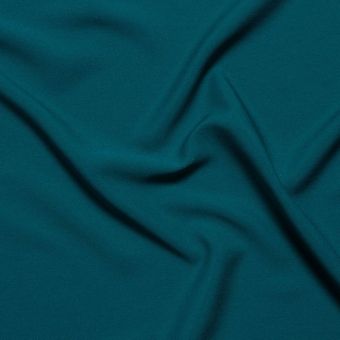 Tissu voile crêpe polyester uni bleu turquoise