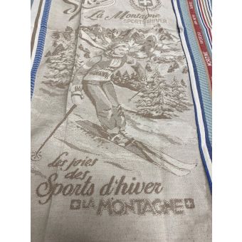 Torchon jacquard motif Skieuse 50 x 70 cm