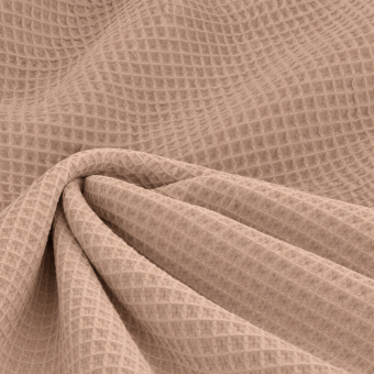 Tissu nid d'abeille éponge uni skin rose