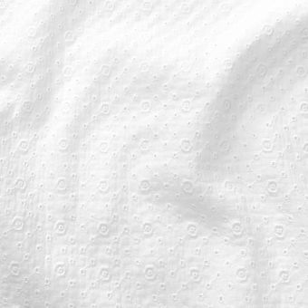 Tissu double gaze broderie géométrique fleurie blanc