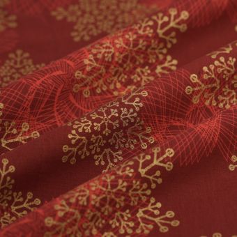 Tissu cretonne de Noël étoile psychédélique rouge