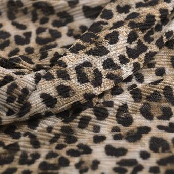 Tissu résille léopard beige