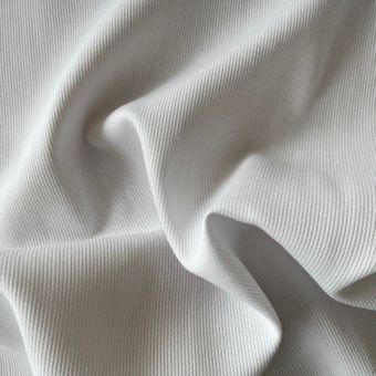 Tissu piqué de coton uni blanc