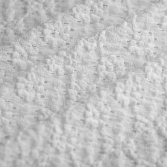Tissu dentelle extensible marguerite écru