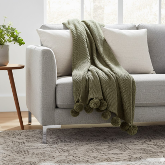 Plaid à pompons vert 125 x 150 cm