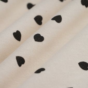 Tissu french terry polycoton Coeur noir écru