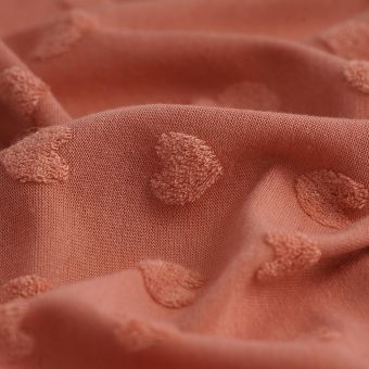 Tissu jersey polyester coeur bouclettes rose