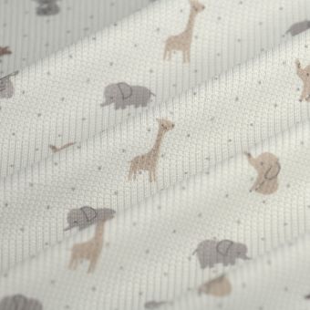 Tissu maille nid d'abeille animaux pastel écru