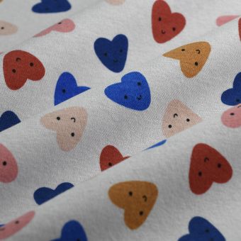 Tissu molleton coeurs visage multicolore