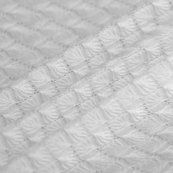 Tissu dentelle extensible géométrique écru