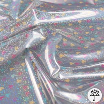 Tissu imperméable foil petit cœur multicolore