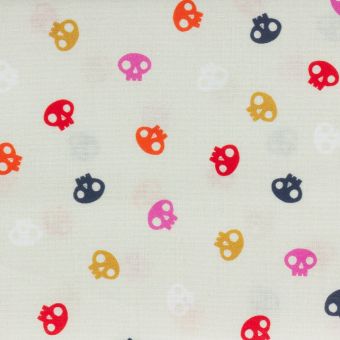 Tissu popeline de coton écru petites têtes de mort colorées