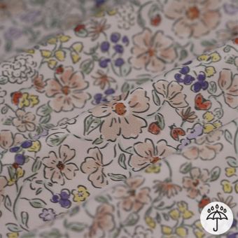 Tissu imperméable imprimé fleuri pastel écru