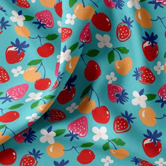 Tissu cretonne coton enduit fruits en folie fond turquoise
