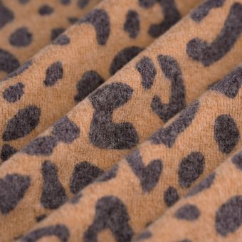 Tissu maille polyviscose doux léopard noir beige
