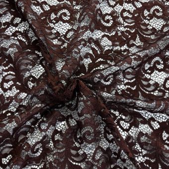 Tissu dentelle guipure arabesques bord festonné marron