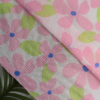 Tissu plumetis coton grande fleur 5 pétales rose