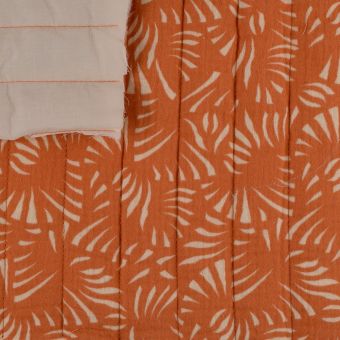 Tissu matelassé double gaze palme abstrait