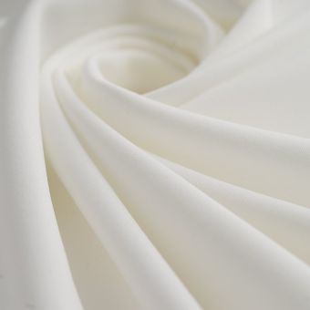 Tissu Crêpe lourd polyester élasthanne blanc soie