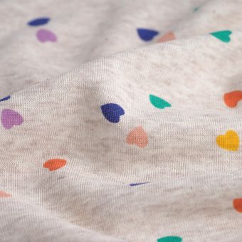 Tissu molleton sweat coeurs beige