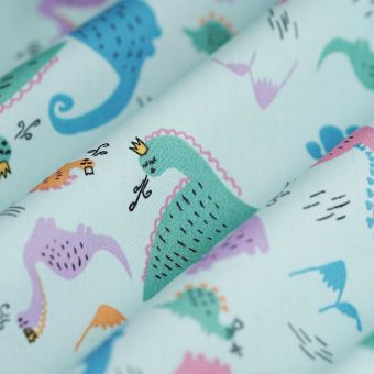 Tissu popeline coton dino couronne pastel
