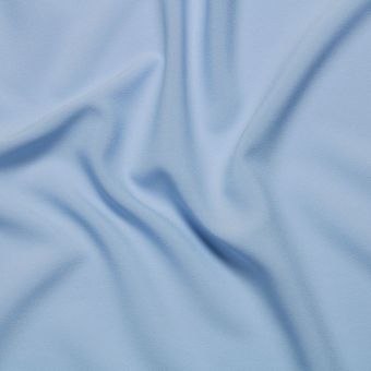 Tissu voile crêpe polyester uni bleu layette