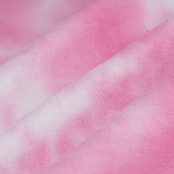 Tissu French terry coton polyester tie and dye rose