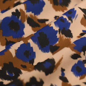 Tissu crêpe polyester léopard floral caramel