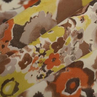 Tissu mousseline Georgette imprimé fleurs orange jaune