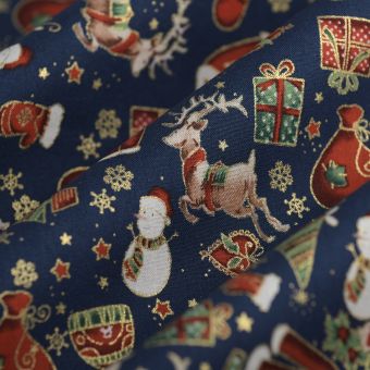 Tissu cretonne de Noël objet père noël bleu