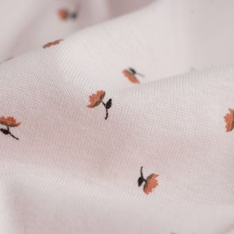 Tissu interlock coton polyester petites fleurs terra rose