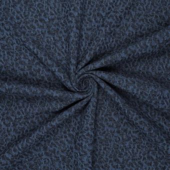 Tissu denim motifs léopard en fil chenille bleu foncé