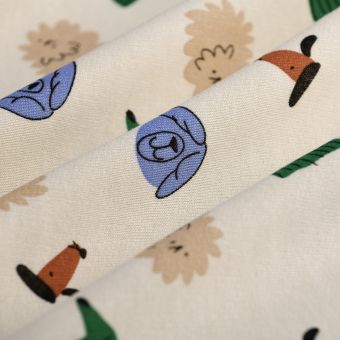 Tissu molleton tète de chien multicolore écru