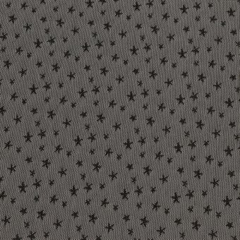 Tissu tulle français stretch souple petites étoiles noir