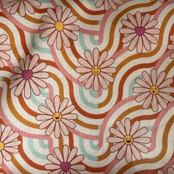 Tissu coton imprimé 70's vagues pâquerettes roses