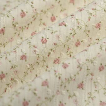 Tissu voile de coton plumetis rose feuillage écru