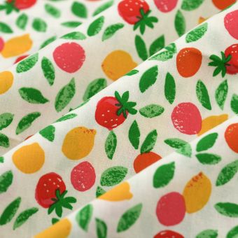 Tissu cretonne petits fruits jaune rose rouge jaune pâle