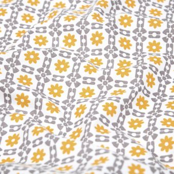 Tissu cretonne enduit imprimé façon carreaux de ciment jaune