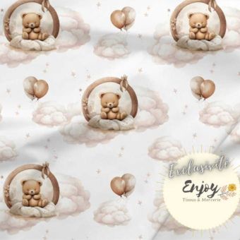Tissu Jersey Animaux Ourson dans les nuages beige vendu par mètre