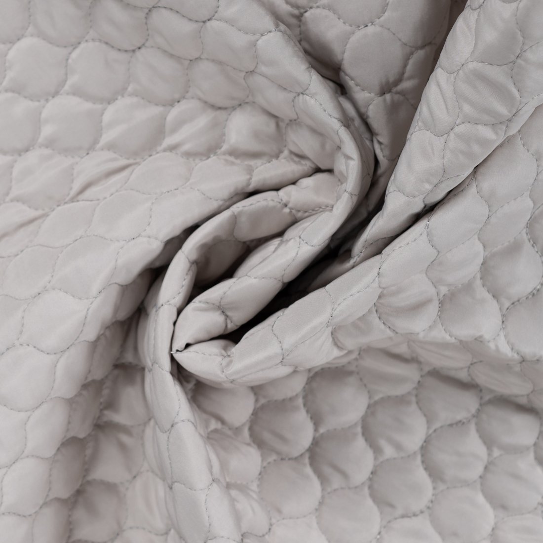Tissu matelassé déperlant forme goutte écru